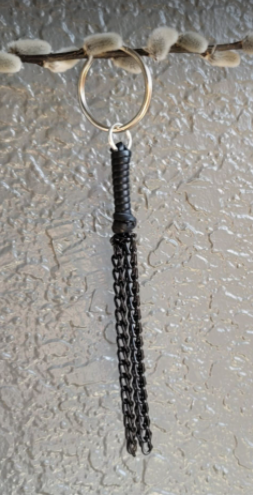 Flogger keychain (Black metal falls)